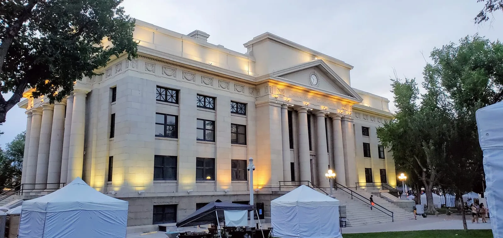 The Yavapai County Courthouse lit up at dusk on Prescott's Courthouse Plaza