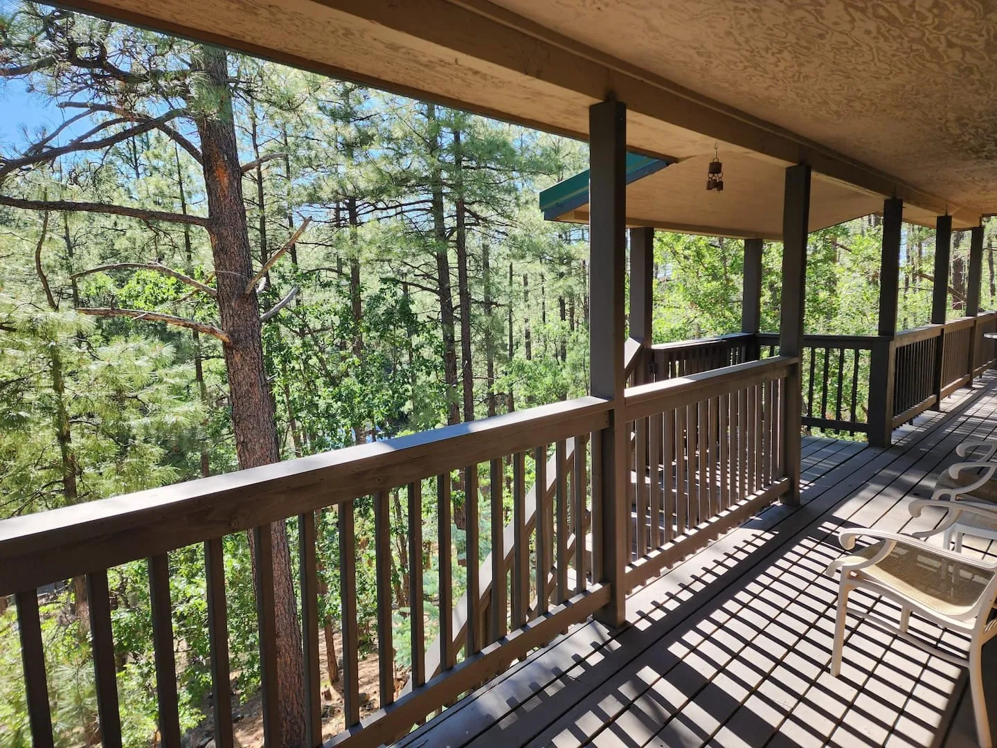 Covered deck looking out into the Groom Creek forest